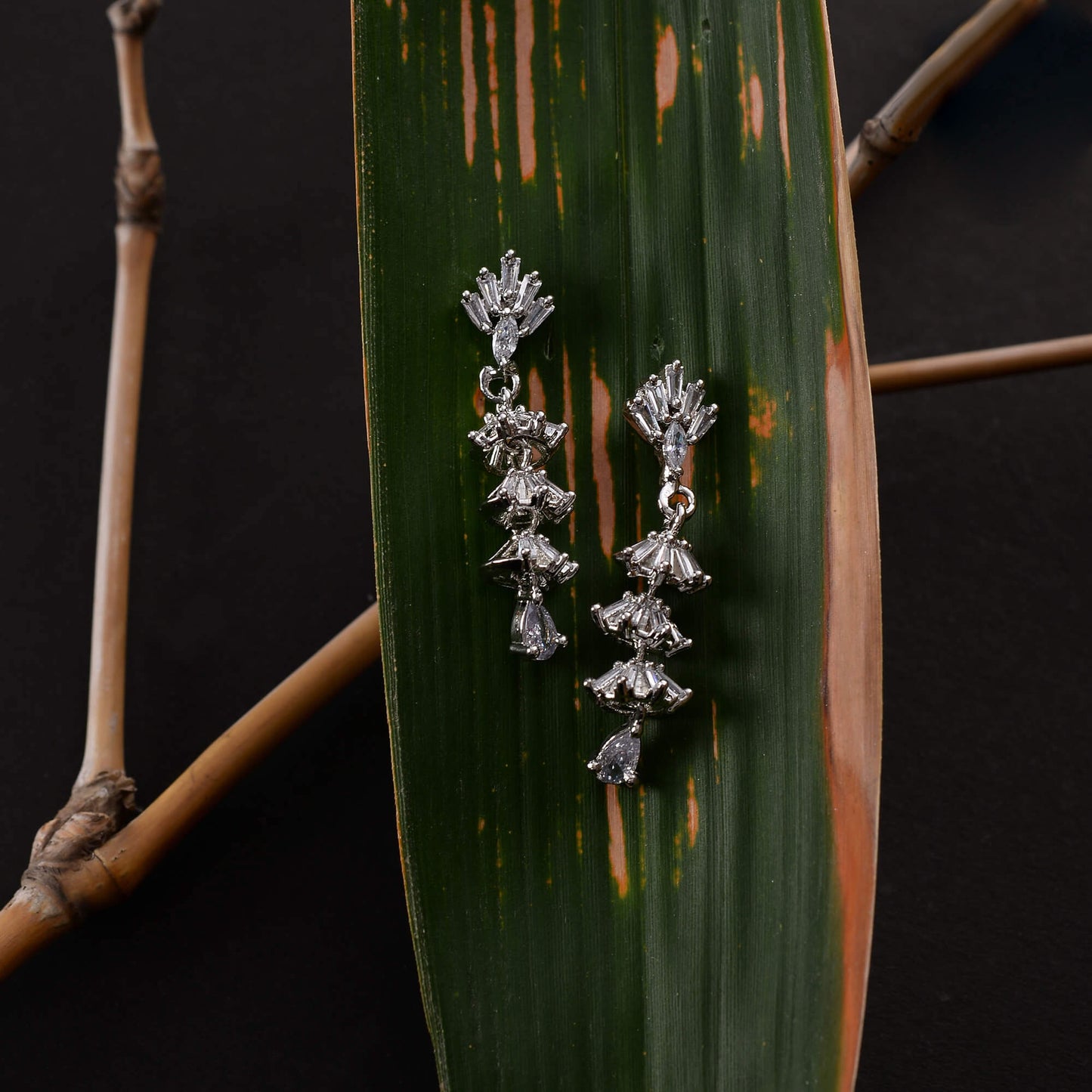 Galaxelle- Stone Studded Zirconia Dangler Earrings